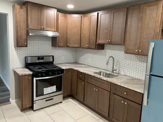 Saddle Hickory Shaker — a kitchen supplied by Mr. Kitchen Cabinet